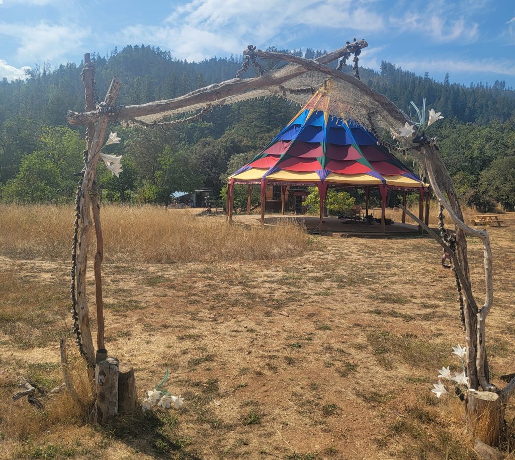 a scenic photo of the outdoors at Camp Queerkster, a queer kinky campout for gender diverse transgender non-binary intersex queers